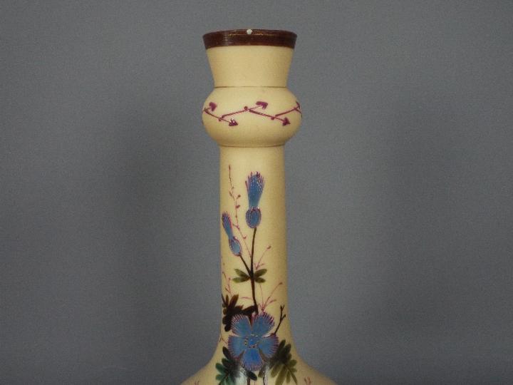 An early 20th century glass vase with hand painted floral decoration, signed to the base, - Image 3 of 6