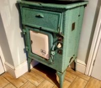 A 1940's Revo R8 enamelled electric cooker, metal plate displays 18727765, 230v, 5.