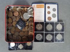 A small collection of coins, Victorian and later, commemorative crowns, decimal coin set.