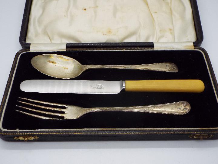 George V hallmarked silver spoon and fork (knife is stainless) contained in fitted case, - Image 3 of 4