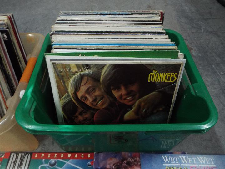 Two boxes of 12" vinyl records to include Erasure, Status Quo, Wet Wet Wet, The Monkees, - Image 4 of 5