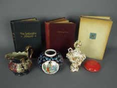 A mixed lot comprising ceramics to include a small Schierholz Plaue urn form vase with applied