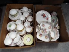 Two boxes of mixed ceramics.