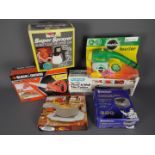 A collection of boxed tools to include a Michelin Hi Power Tyre Inflator,