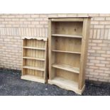 Two pine, freestanding bookcases, largest approximately 150 cm x 84 cm x 30 cm.