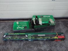 An Oregon PP350C electric chainsaw and a Gardenline battery hedge trimmer.