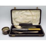 George V hallmarked silver spoon and fork (knife is stainless) contained in fitted case,