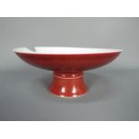 A Chinese sang de boeuf stem bowl / tazza, approximately 9 cm (h) and 20.