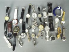 LOT WITHDRAWN - A collection of modern wristwatches and similar, lady's and gentleman's.