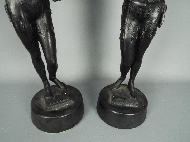 Two cast metal sculptures raised on circular plinths, approximately 47 cm (h). - Image 4 of 5