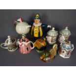 A collection of teapots, with some novelty examples by Tony Wood,