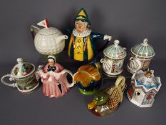 A collection of teapots, with some novelty examples by Tony Wood,