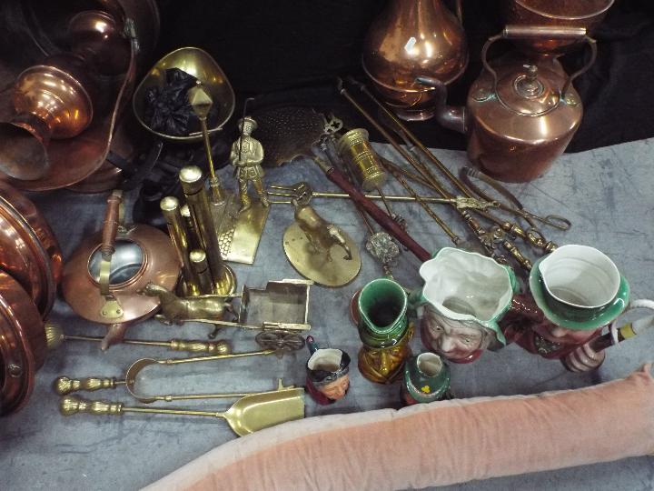 A large collection of copper and brass ware to include teapot, ewers / jugs, ornaments and similar, - Image 4 of 5