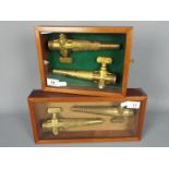 Breweriana - Four brass brewers taps, Veribest by Harry Mason, Birmingham, mounted in display cases.