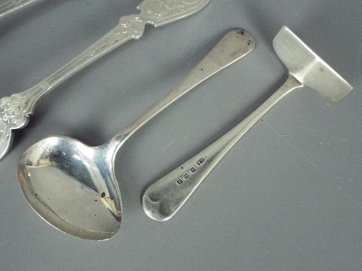 A Victorian spoon and fork with engraved decoration, Sheffield assay 1869/1870, - Image 3 of 3