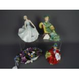 Three Royal Doulton figurines comprising Ascot # HN2356, Linda # HN2106 and Pirouette #HN2216,