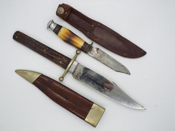 A Victorian Bowie knife by J Rodgers & Sons, Sheffield, with two piece stag horn grip,