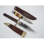 A Victorian Bowie knife by J Rodgers & Sons, Sheffield, with two piece stag horn grip,