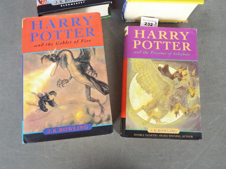 Four hardback Harry Potter books, all with dust jackets, - Image 2 of 7