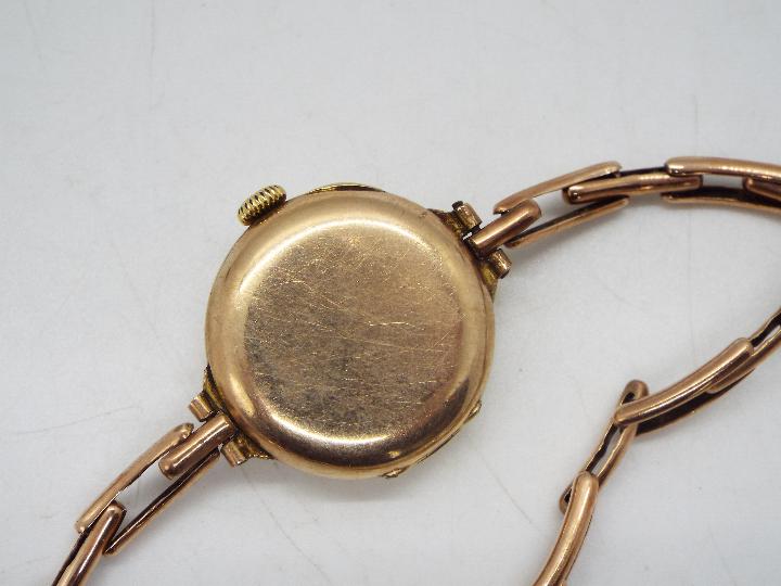 A lady's 9ct gold cased wristwatch on expanding bracelet marked Britannic 9ct (bracelet A/F), - Image 3 of 5