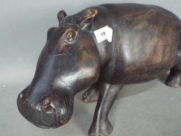 A carved, hardwood hippopotamus, - Image 2 of 3