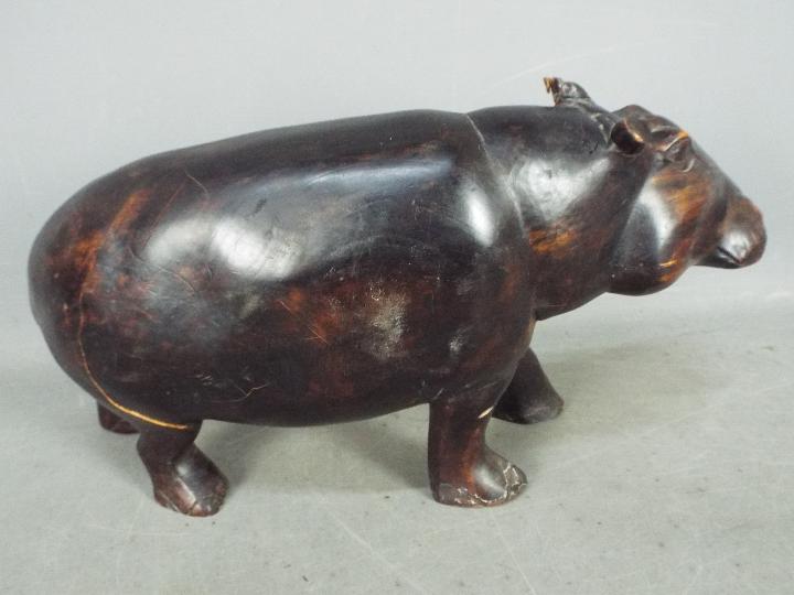 A carved, hardwood hippopotamus, - Image 3 of 3