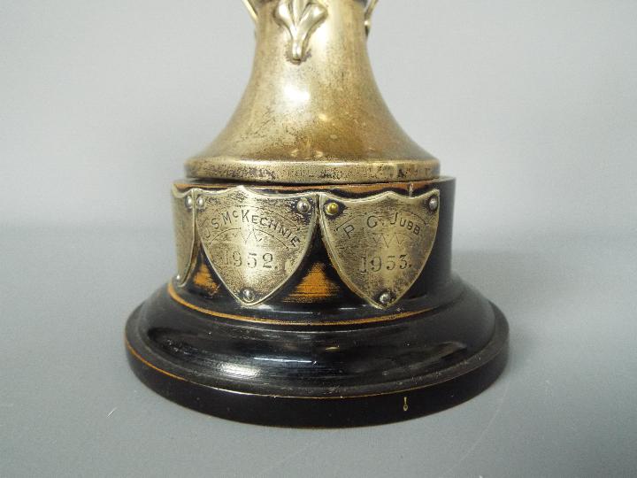 A George V hallmarked silver, Art Nouveau style, triple handled trophy, Sheffield assay 1933, - Image 4 of 6