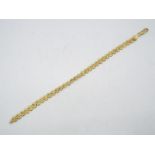 A high purity yellow metal bracelet, stamped 750 for 18ct, 19 cm length, approximately 6.