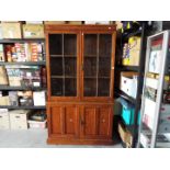 A pine library bookcase, approximately 197 cm x 114 cm x 43 cm.