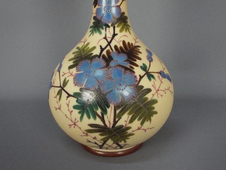 An early 20th century glass vase with hand painted floral decoration, signed to the base, - Image 2 of 6