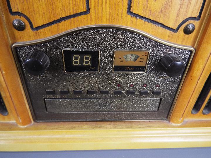 An antique style music system with radio, CD player and vinyl turntable. - Image 2 of 3