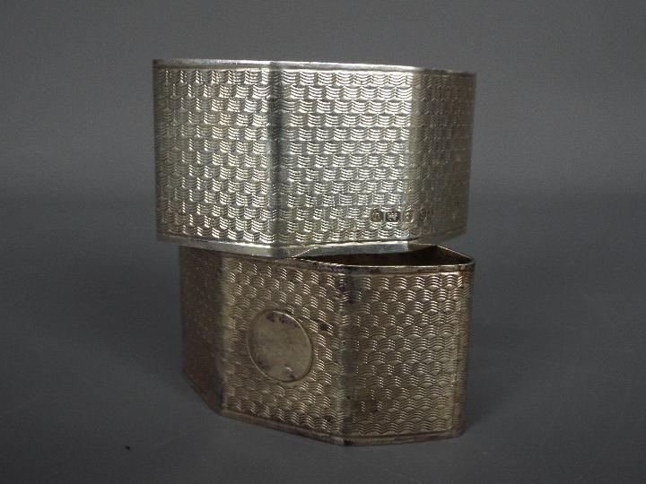 Four hallmarked silver napkin rings, - Image 2 of 4