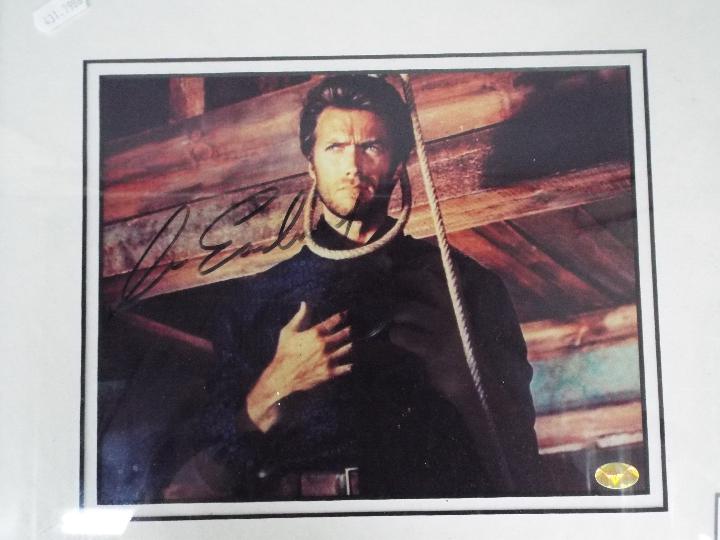 Clint Eastwood - A signed photograph, mounted and framed under glass, - Image 2 of 6