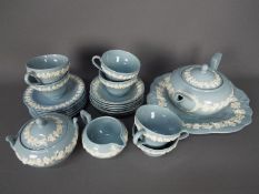 Wedgwood Etruria Embossed Queens Ware tea service comprising six trios, teapot, cream jug,