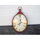 A large, antique style wall clock in the form of a pocket watch, approximately 97 cm x 46 cm.