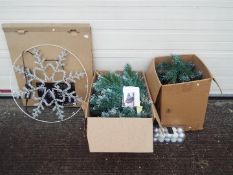 Christmas Decorations - A Christmas tree and a large Clear Snowflake Rope Light Silhouette.