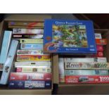 A large quantity of jigsaw puzzles, two