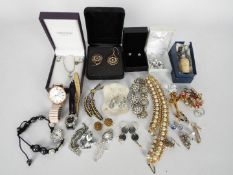 A small quantity of costume jewellery, some stamped 925, Swarovski brooch, watches and other.