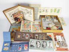 Lot to include a quantity of cigarette cards, loose and in albums,