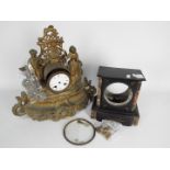 A figural mantel clock for restoration and a mantel clock case.