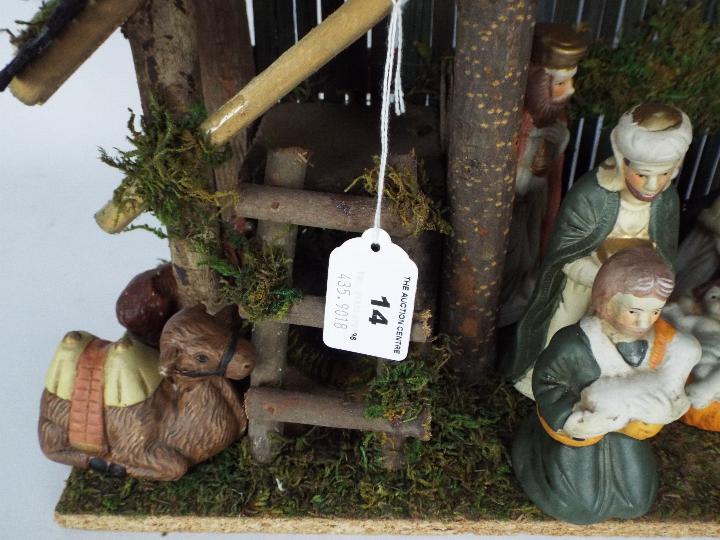 A Christmas Nativity diorama with ceramic figures, - Image 3 of 4