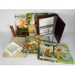 Lot to include Rupert The Bear annuals, binder of first day covers,
