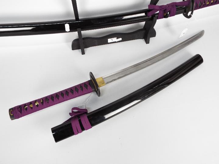 A pair of good quality reproduction Samurai swords comprising katana and wakizashi, - Image 3 of 9