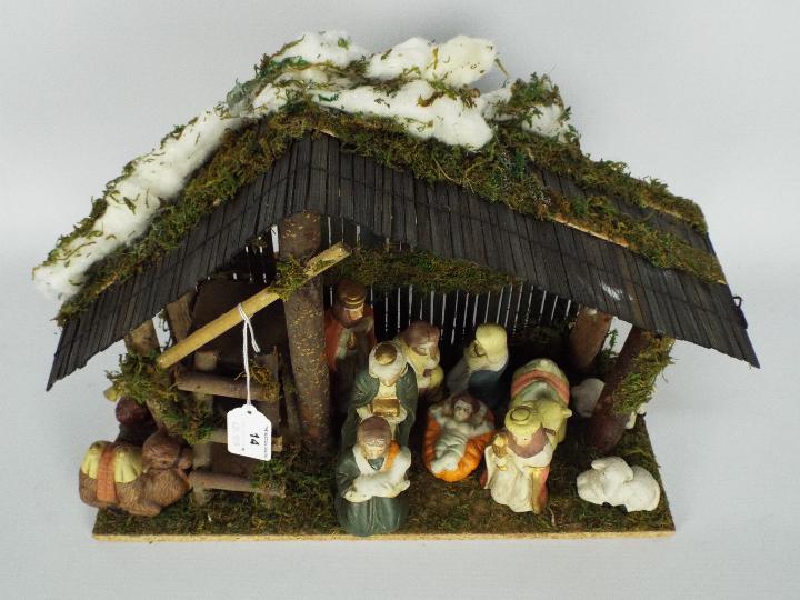 A Christmas Nativity diorama with ceramic figures, - Image 4 of 4