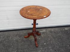 A burr walnut veneered occasional table, approximately 70 cm x 52 cm.