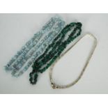 A malachite chip necklace, approximately 84 cm (l),