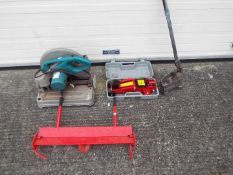 A quantity of tools to include a chop saw, trolley jack, Clarke Strong-Arm metal folder and other.