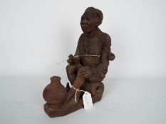 Ethnographica - An African pottery figurine, probably Kenyan,