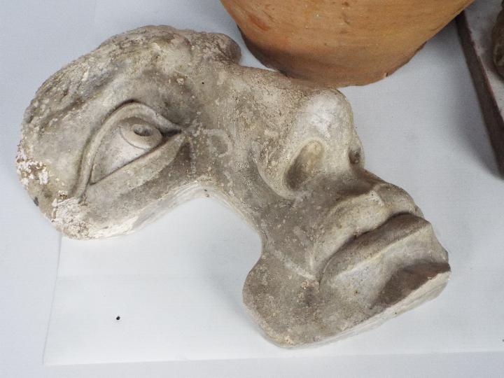 Garden ornaments to include reconstituted stone wall masks, large part glazed pot and similar. - Image 3 of 5