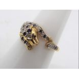 A 9ct gold sapphire and diamond, Cartier style ring in the form of a panther, size O½,